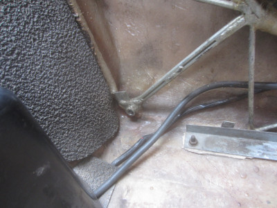 LH clean subframe belt bolt hole 230_0109.JPG and 
